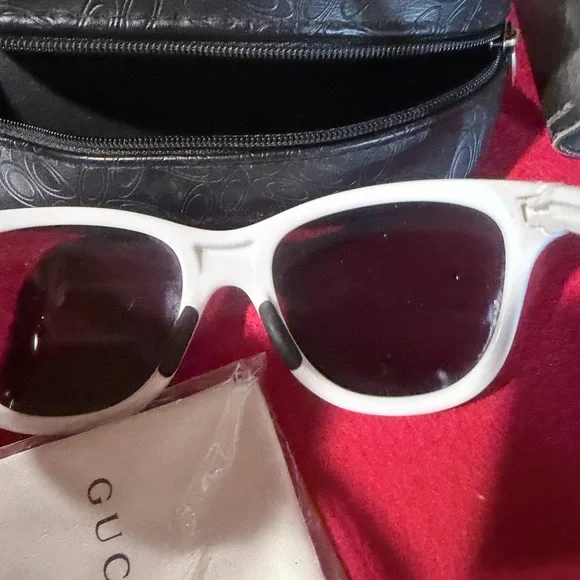 Gucci sunglasses with gucci cloth. Not sure about brand on case Great condition How To Tell If Your Gucci Sunglasses Are Real - Mia Burton main image 3